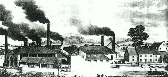Abbildung 8: Ein Eisenwerk im Jahre 1827, das offenbar als Energiequelle sowohl Wasser- wie Dampfkraft benutzt. Die Eisenbarren werden mittels Lastkähnen auf dem Fluss transportiert (aus Wright 1972, 27)